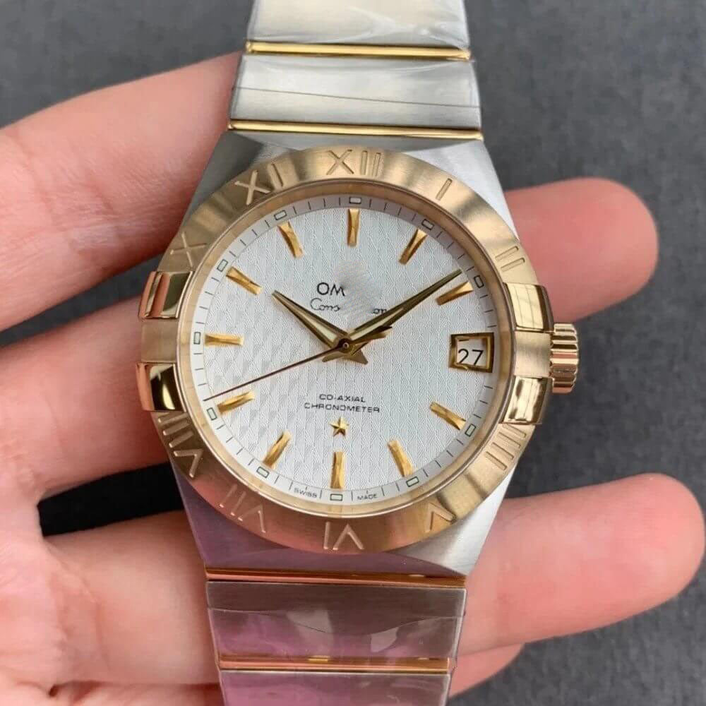 REPLICA CONSTELLATION 123.20.38.21.02.006 VS FACTORY GOLD BEZEL