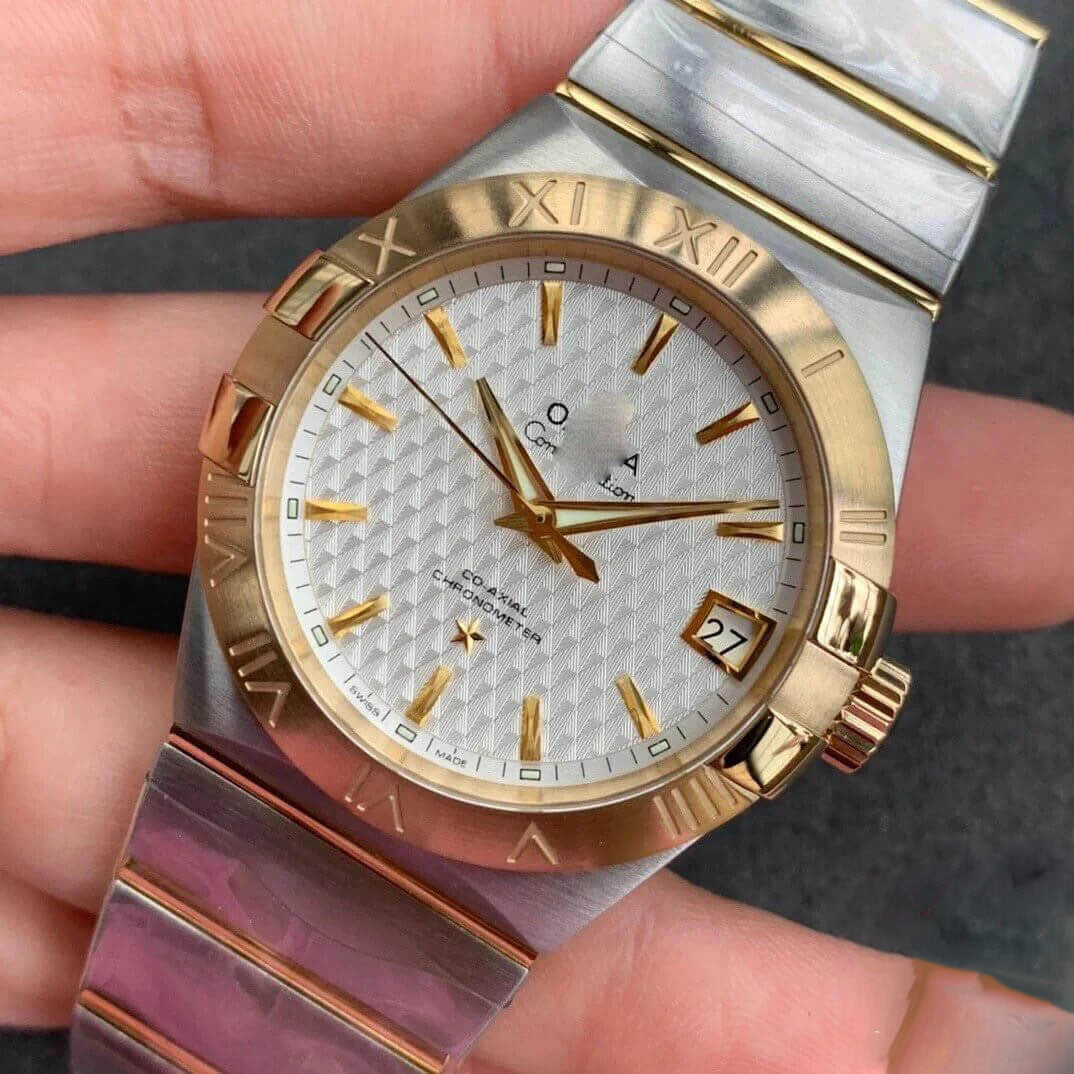 REPLICA CONSTELLATION 123.20.38.21.02.006 VS FACTORY GOLD BEZEL