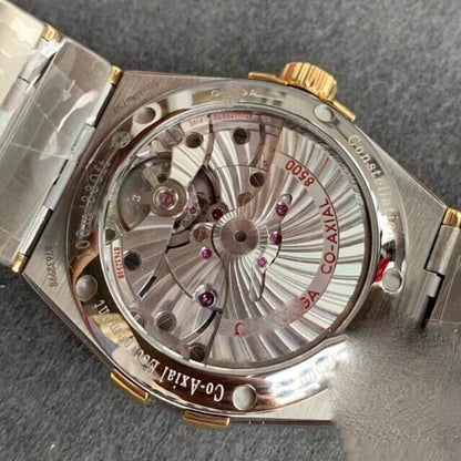 REPLICA CONSTELLATION 123.20.38.21.08.001 VS FACTORY GOLD DIAL